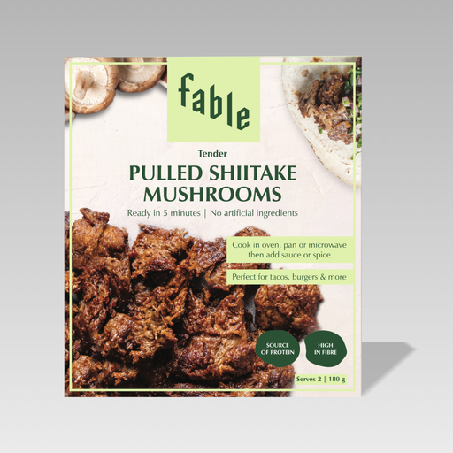 A package of Fable Pulled Shitake Mushrooms on a light gray background. The front of the packaging features a large photo of cooked mushrooms, a small photo of sliced mushrooms, and a taco, with the Fable brand logo at the top.