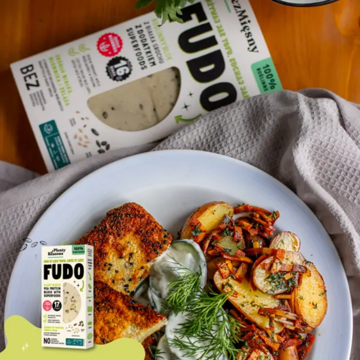 Plate of food with Fudo products on a wooden table