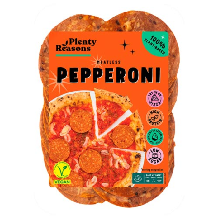 A package of Plenty Reasons Meatless Pepperoni pizza slices on a white background. The packaging features a bright orange background with the brand name 'Plenty Reasons' and 'PEPPERONI' in bold black letters, along with an image of pepperoni pizza slices and various certification badges.