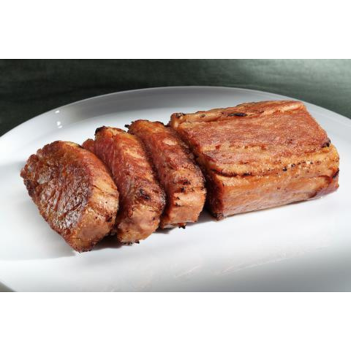 sliced vegan pork belly on plate