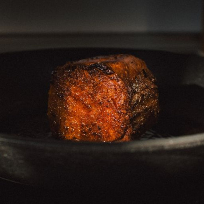juicy marbles loin cooking in pan